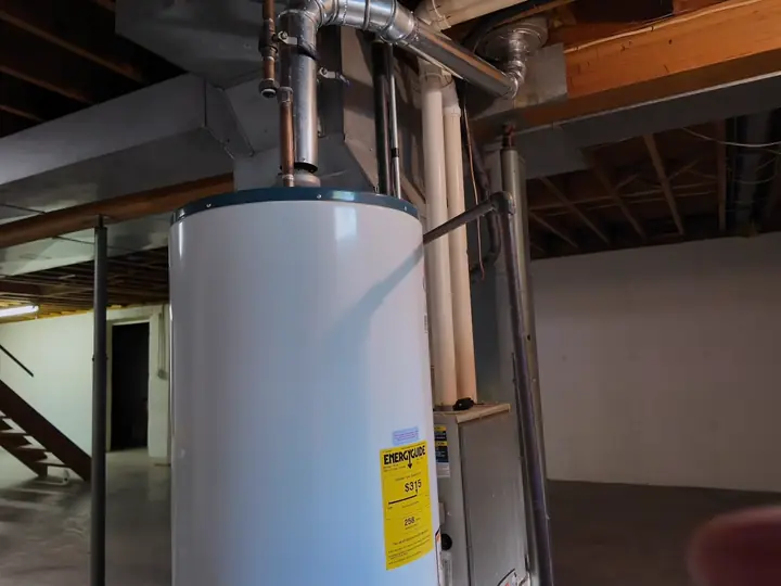 New gas water heater after water heater replacement in a Revere, MA basement